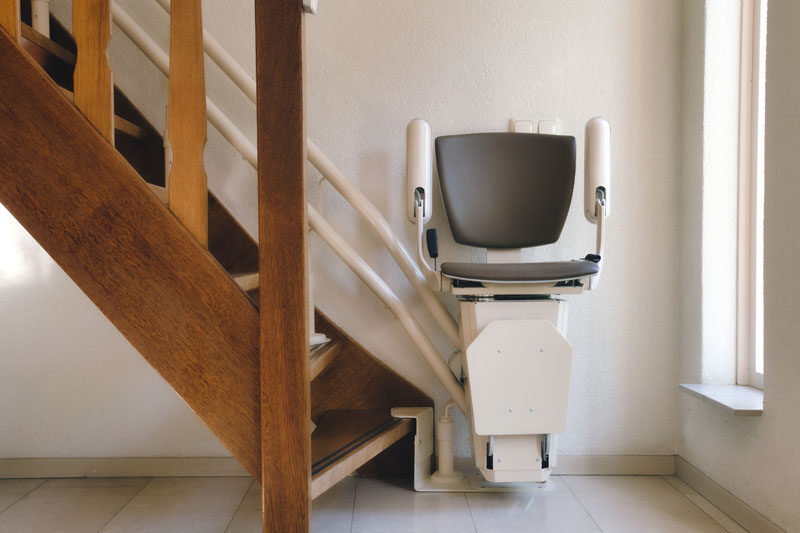 Stairlift mounted on the stairs